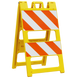 Yellow safety barrier with orange and white stripes on a white background