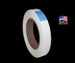 Roll of tape with a blue label and 'Made in the USA' stamp on a black background