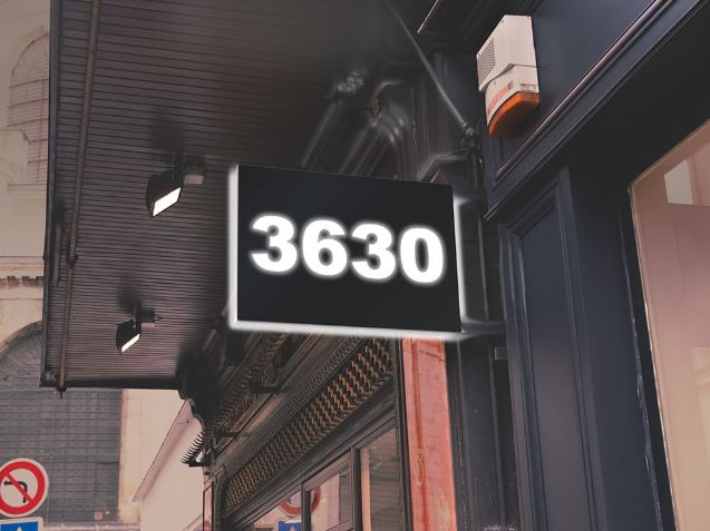 Digital display with the number '3630' on a building exterior.
