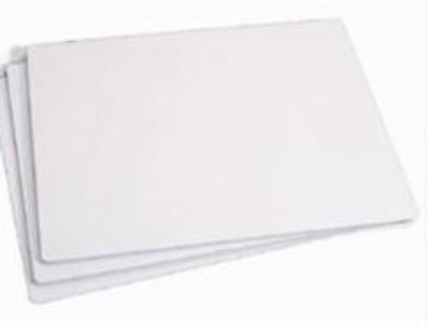 Stack of white paper sheets on a white background