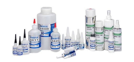 Collection of Parfik adhesive bottles on a white background