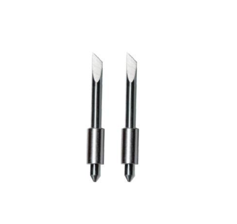 Two metal tools with pointed ends on a white background