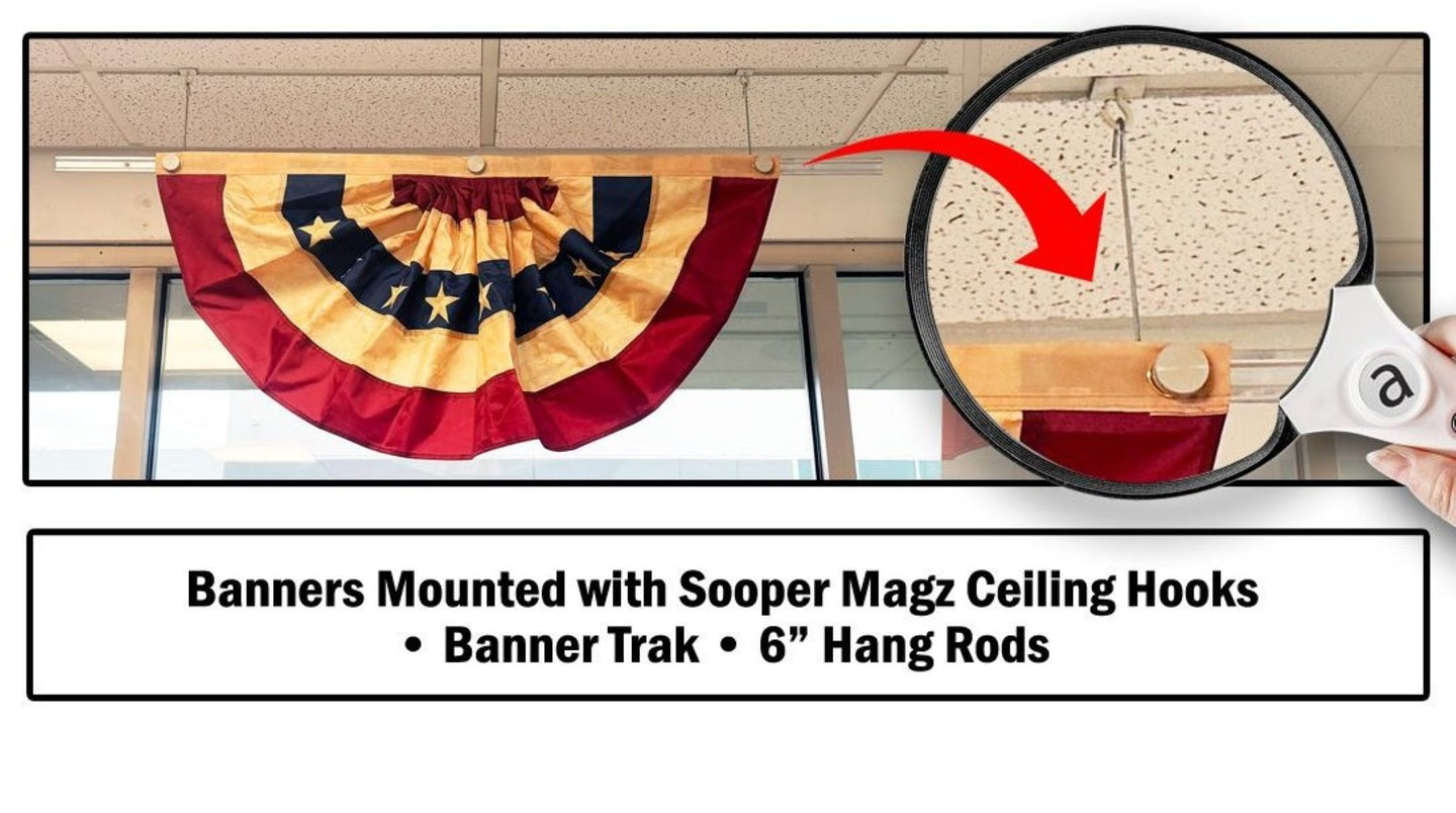 Banners mounted with Sooper Magz ceiling hooks on a wooden surface.