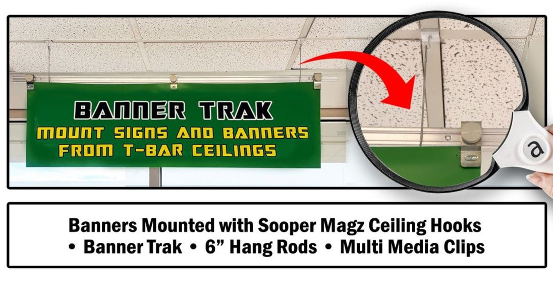 Advertisement for Banner Trak system with green banner and ceiling hooks.