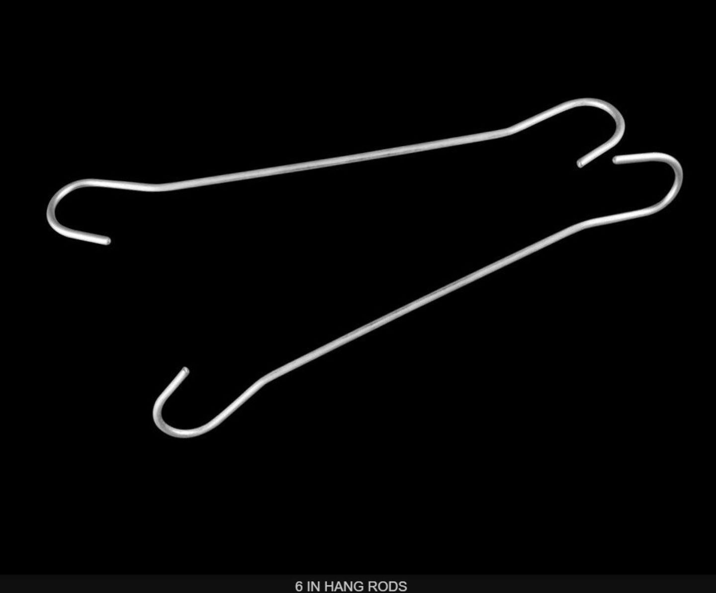 White metal hanger on a black background