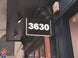 Digital display showing the number '3630' on a building exterior.