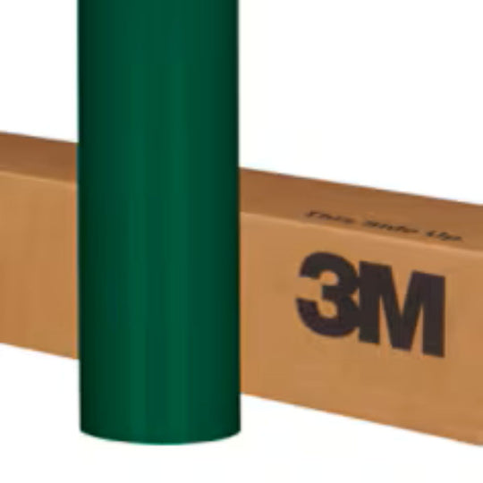 Green roll of 3M vinyl wrap on a white background