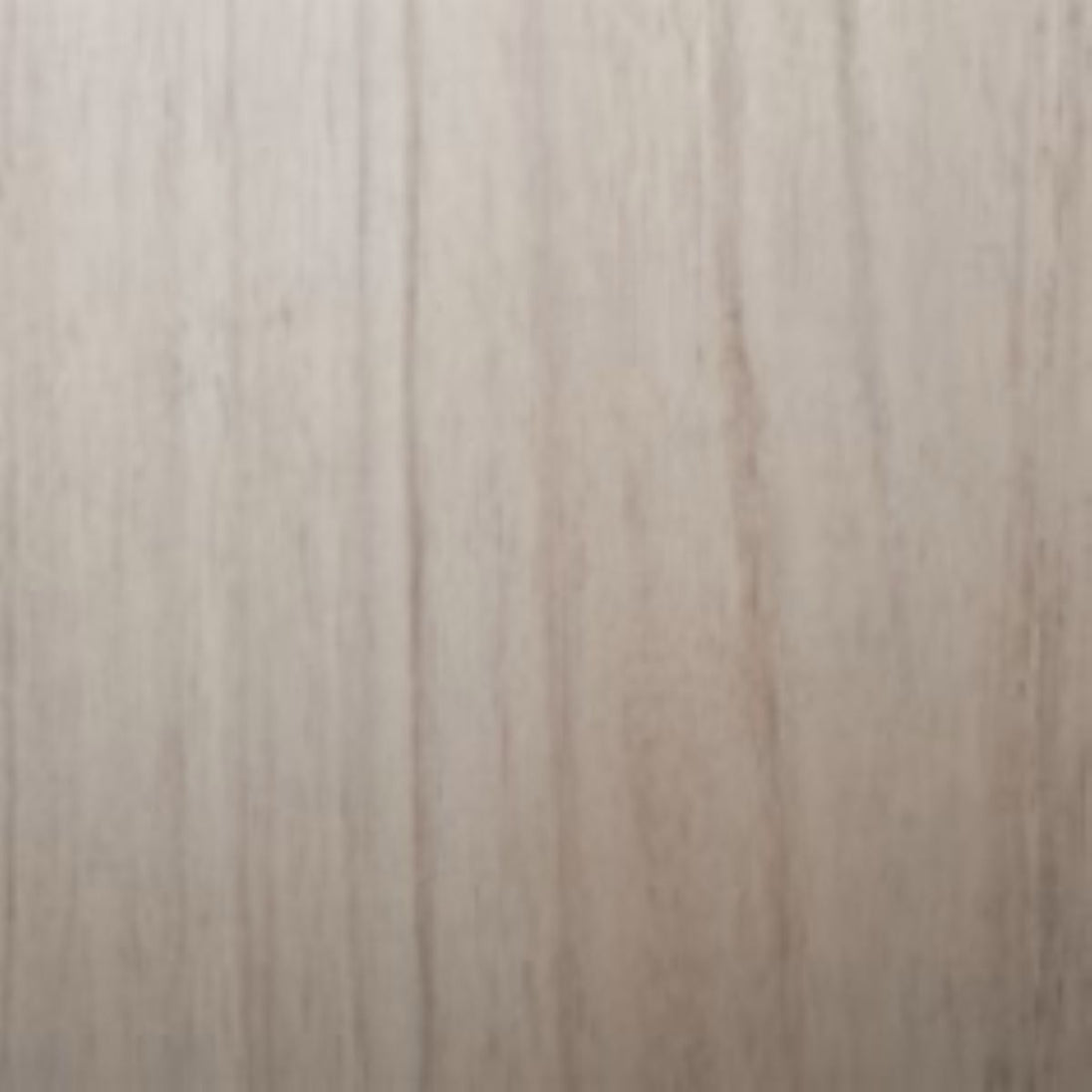 Close-up of a wooden surface with a light brown color and visible grain pattern.