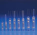 Set of clear plastic syringes with needles on a blue background