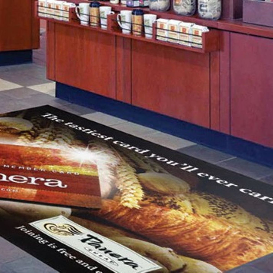 Floor mat with a bread advertisement in a store setting