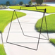 Black metal stand on a garden path with green grass and plants in the background