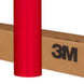 Red 3M vinyl wrap roll on a cardboard box with '3M' branding.