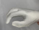 Silver metallic glove on a gray background