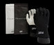Black and white gloves with 'Capital D' branding on a black background