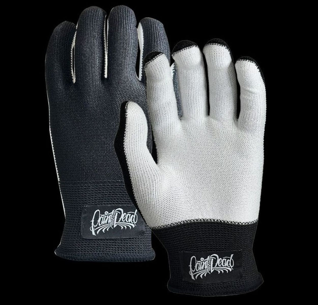Pair of black and gray gloves with 'Cruel Dead' branding on a clear background