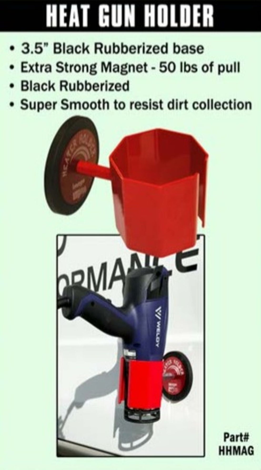 Red heat gun holder with black rubberized base and magnet on a green background