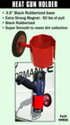 Red heat gun holder with black rubberized base and magnet on a green background