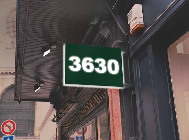 Digital display showing the number '3630' on a building exterior.