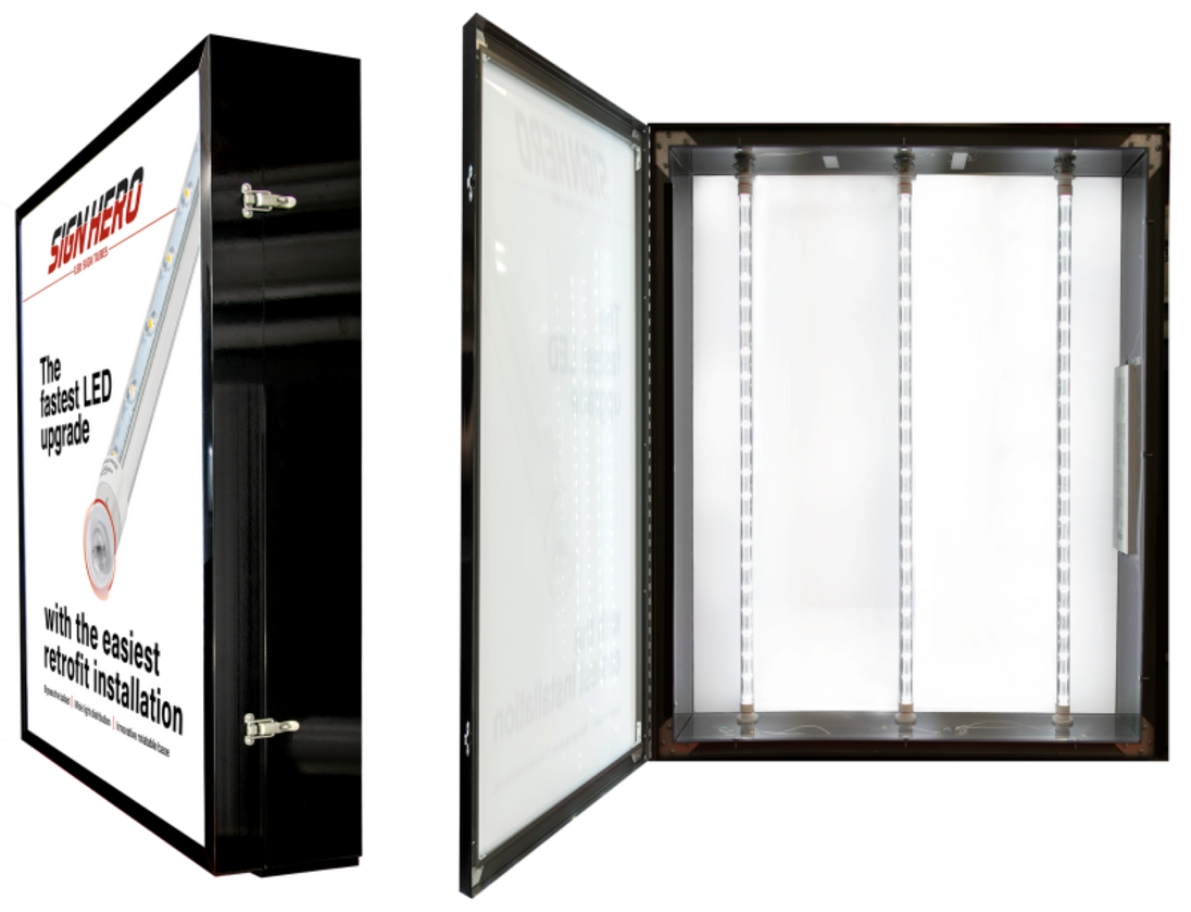 Two views of a SIGNHERO LED wall light box: one showing the black cabinet exterior with a white front panel and product graphic, and the other showing the open cabinet interior with four vertical LED light bars inside.