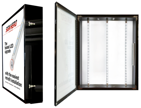 Two views of a SIGNHERO LED wall light box: one showing the black cabinet exterior with a white front panel and product graphic, and the other showing the open cabinet interior with four vertical LED light bars inside.