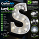 A large illuminated letter 'S' sign made from embedded LED channel lights, shown on a dark background with product specs, branding, and feature callouts around it. Visible brand text includes CrafterNV and LumiLink Mini.