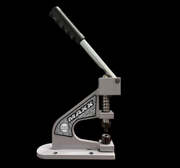 Metal tool with a lever and 'MAXX' branding on a black background