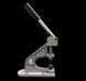Metal tool with a lever and 'MAXX' branding on a black background