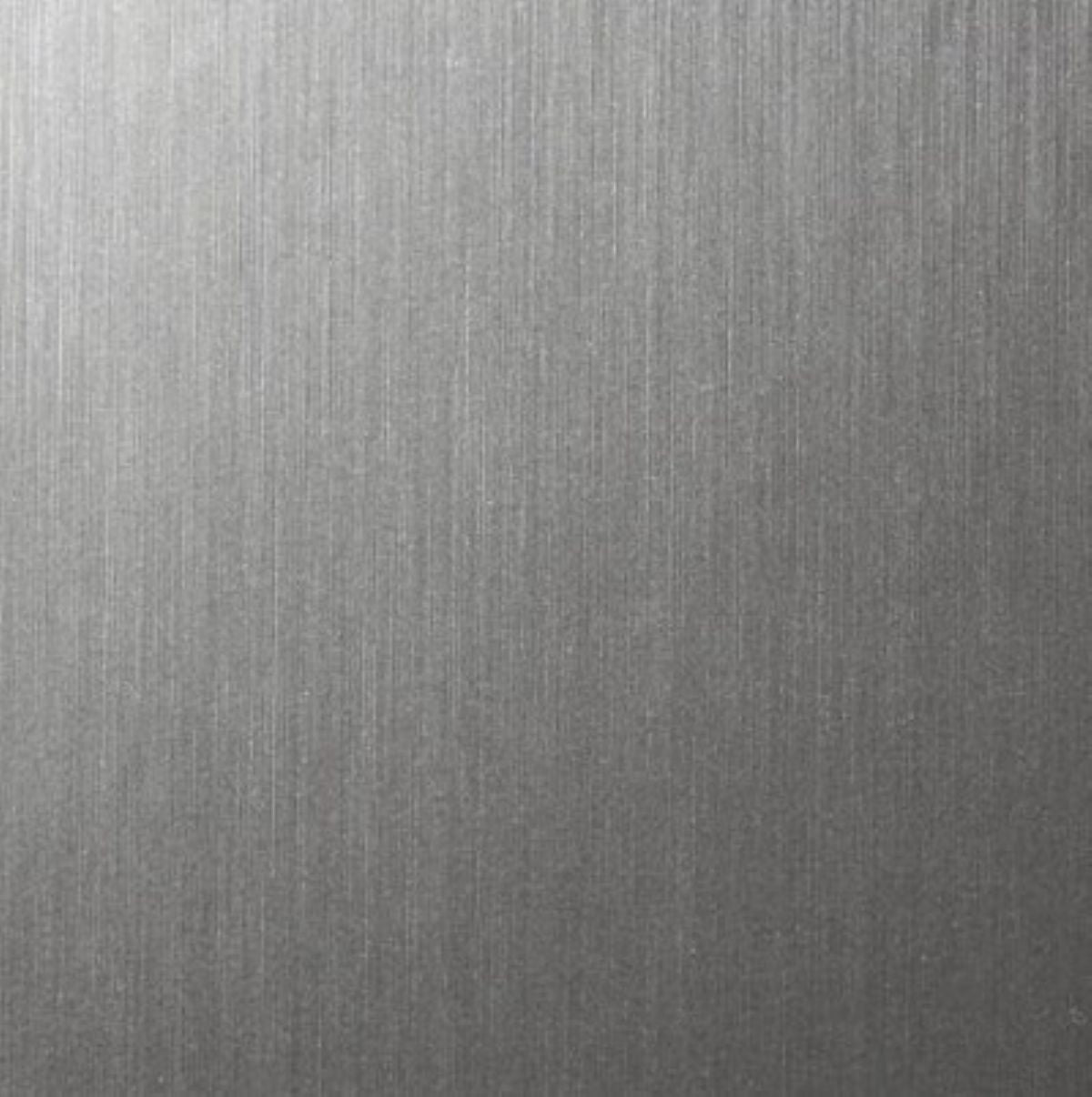 A close-up of a brushed metallic surface with fine vertical texture and a silver-gray finish.