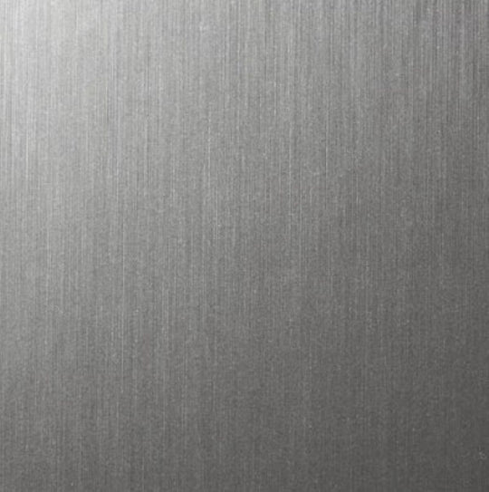 A close-up of a brushed metallic surface with fine vertical texture and a silver-gray finish.