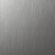 A close-up of a brushed metallic surface with fine vertical texture and a silver-gray finish.