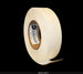 Roll of tape with a label on a black background