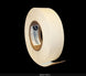 Roll of tape with a label on a black background