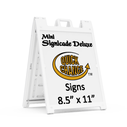 White a-frame sign with 'Quick Change' branding and text on a white background