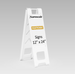 White sign stand with 'Narrowcade' and 'Plasticade Signs' branding on a gray background