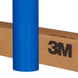 Roll of blue vinyl wrap with a cardboard box featuring the 3M logo on a white background