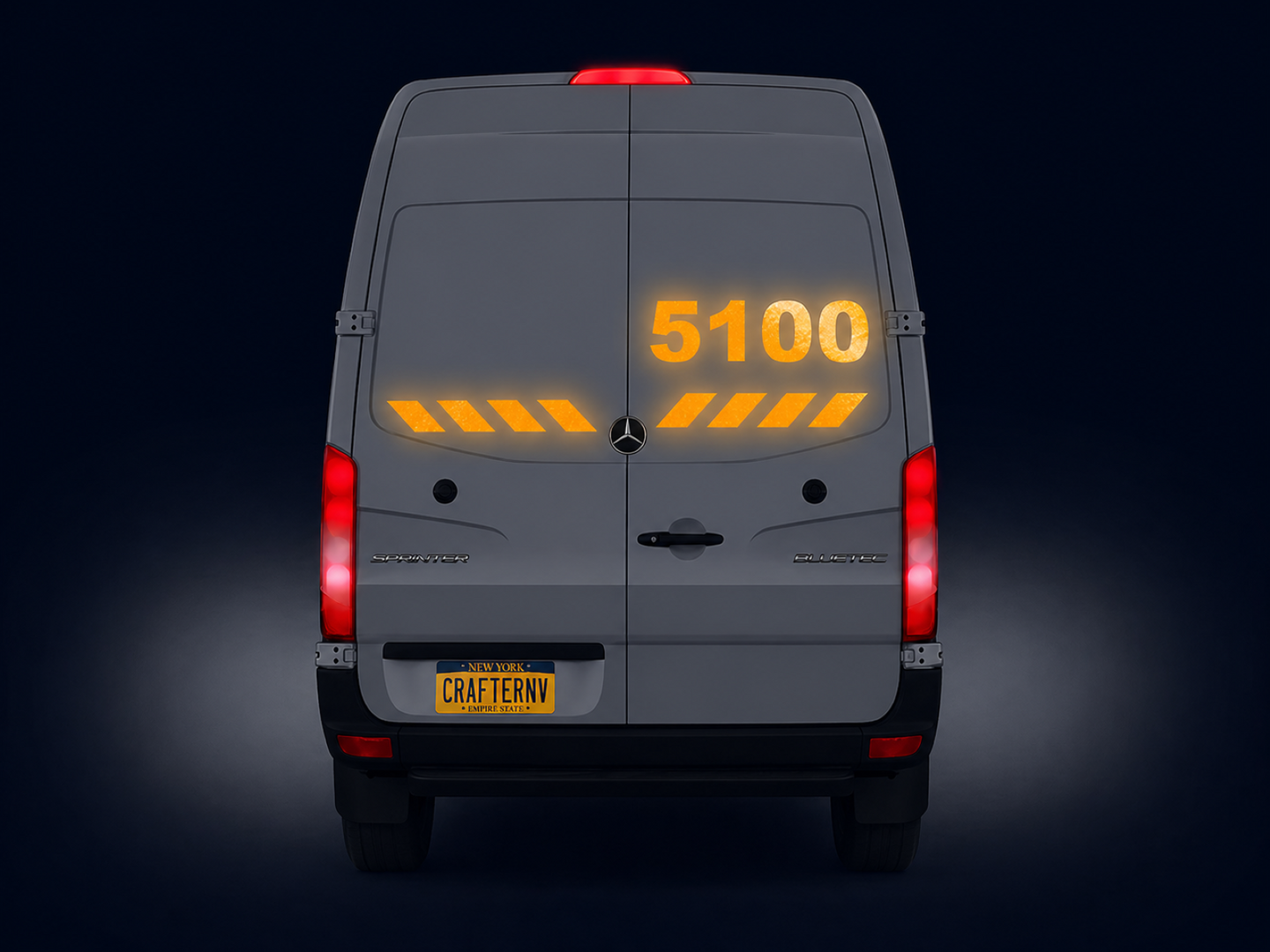 Back view of a gray van with digital display and 'Crafter NV' branding on a dark background