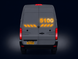 Back view of a gray van with digital display and 'Crafter NV' branding on a dark background