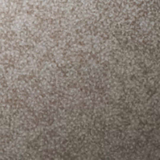 Close-up of a textured beige carpet