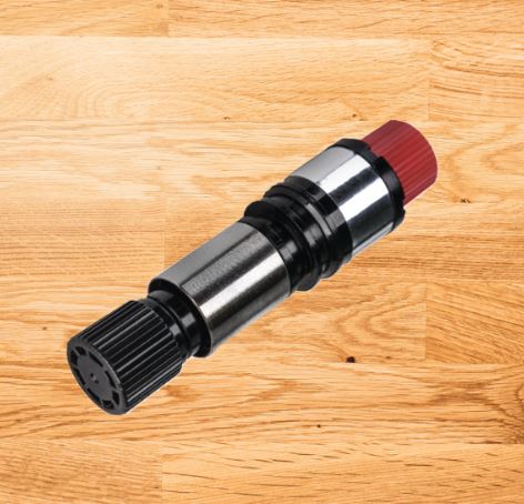 Mechanical component on a wooden surface