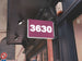 Digital display showing the number '3630' on a building exterior.