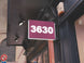 Digital display showing the number '3630' on a building exterior.