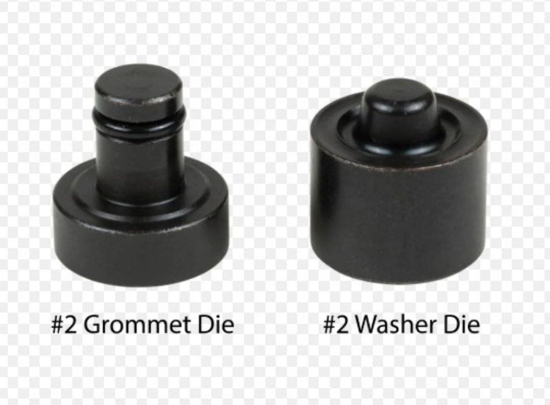 Two black metal dies labeled '#2 Grommet Die' and '#2 Washer Die' on a white background.