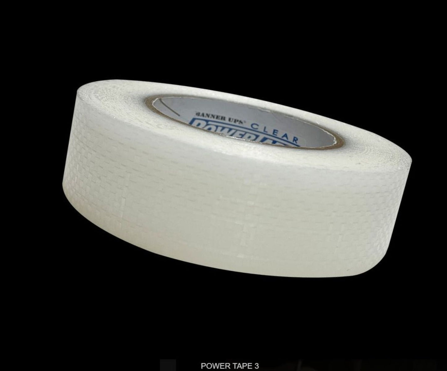 Clear tape roll on a black background