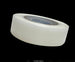 Clear tape roll on a black background