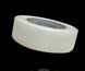 Clear tape roll on a black background