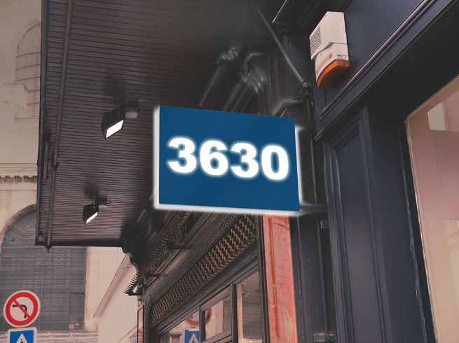 Building facade with a sign displaying the number '3630'.