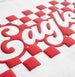 Close-up of a red and white checkered pattern with 'Google' branding.