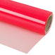 Roll of red vinyl wrap on a white background