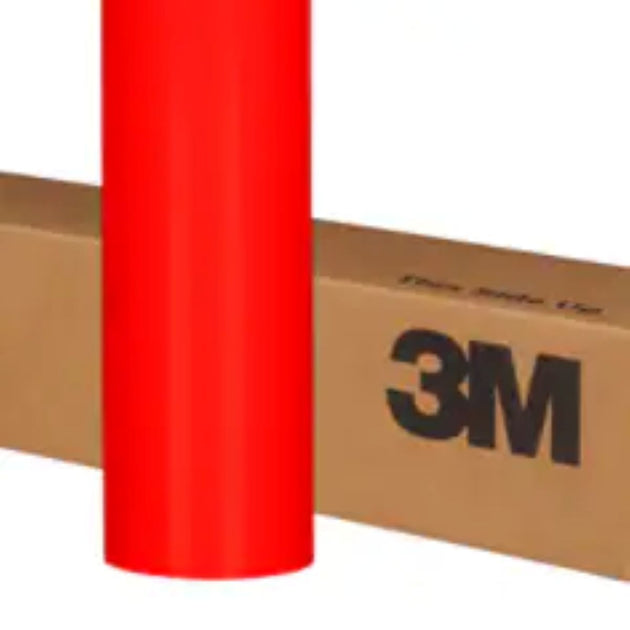 Roll of red 3M vinyl wrap on a cardboard box with 3M branding.