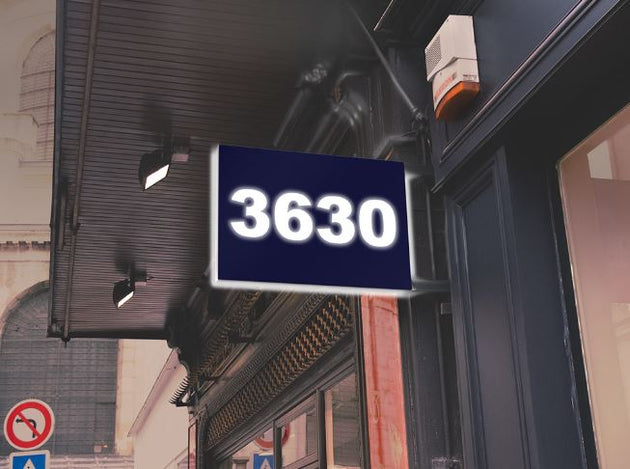 Digital display with the number '3630' on a building exterior.